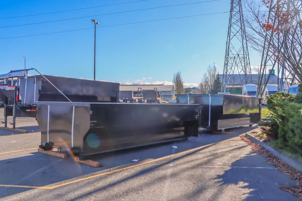 Roll-off dumpster ready for waste disposal at job site for 12 Yard Dumpster Rental in Garland